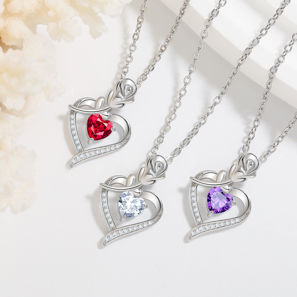 Collier en forme de cœur avec strass, motif fleur éternelle, idéal pour la Saint-Valentin.