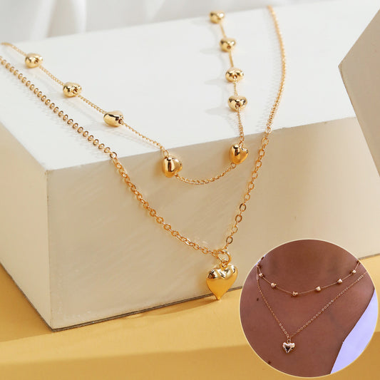 Collier à double chaîne fine avec pendentif en forme de cœur pour femme, collier multicouche en métal doré, accessoires de bijoux tendance
